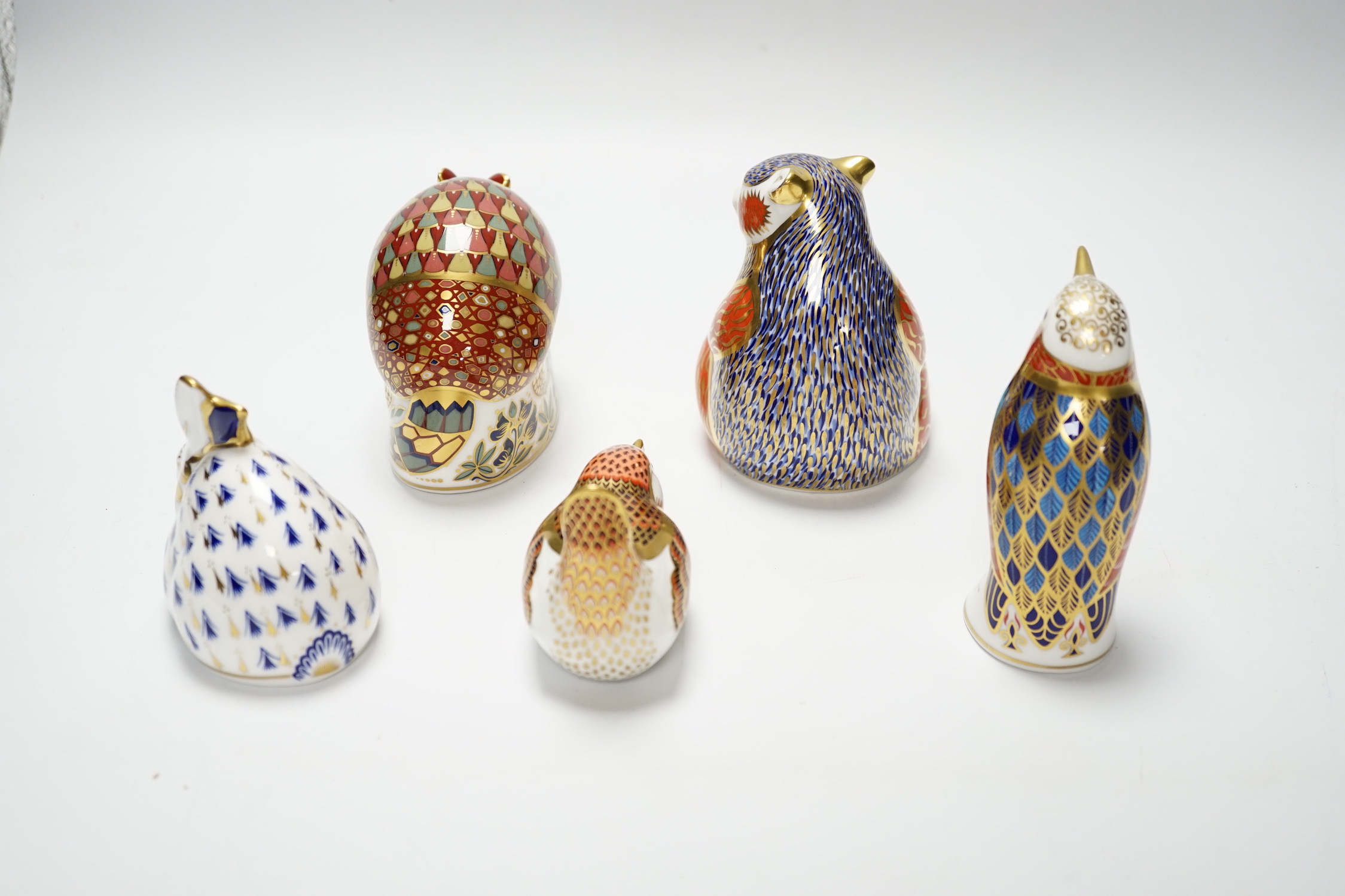 A collection of five Royal Crown Derby animal and bird paperweights